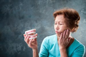 3 Reasons Your Denture May Be Loose - South Calgary Dentures - Implants and Dentures Calgary