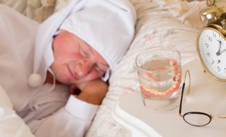Here’s Why You Shouldn’t Sleep With Your Dentures - South Calgary Dentures - Calgary Denture and Implant Clinic